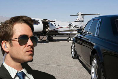 Limousine and private jet on landing strip. --- Image by © moodboard/Corbis